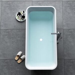 Solid surface free standing bath tub with drainer and pipe overflow